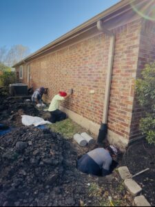 Holes dug for piles then filled